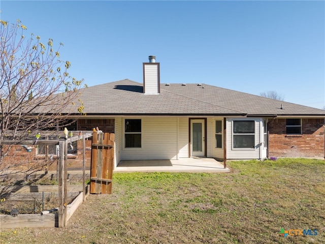 4612 Shawn Dr, Killeen, TX 76542 - back of house with a lawn and a patio area