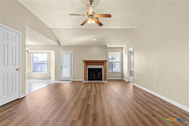 4612 Shawn Dr, Killeen, TX 76542 - unfurnished living room featuring hardwood / wood-style floors, ceiling fan, plenty of natural light, and vaulted ceiling