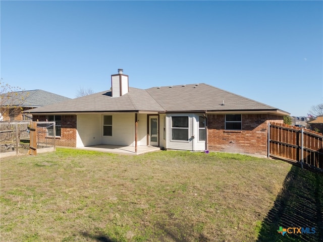 4612 Shawn Dr, Killeen, TX 76542 - back of property with a yard and a patio