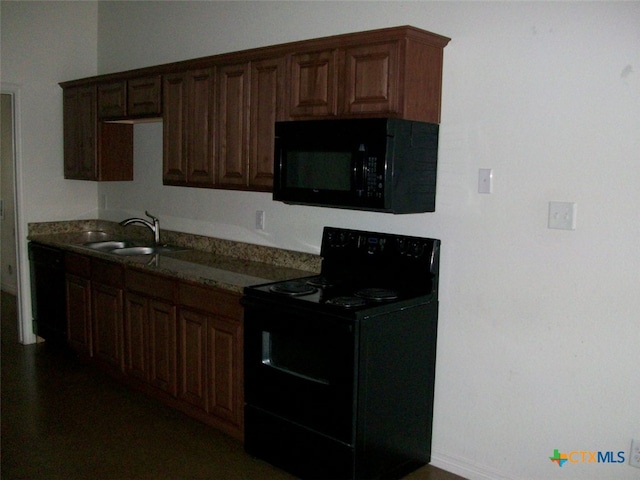 kitchen featuring black appliances and sink