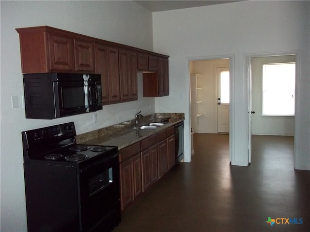 kitchen with sink and black appliances