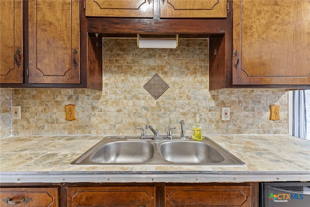 2013 Moonlight Dr, Killeen, TX 76543 - kitchen featuring tasteful backsplash, dishwasher, and sink