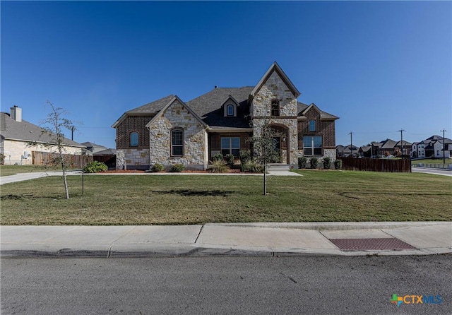 view of front facade with a front lawn