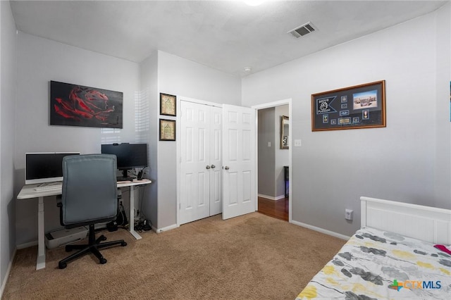 513 Leo Ln, Killeen, TX 76542 - bedroom with a closet, visible vents, baseboards, and carpet floors