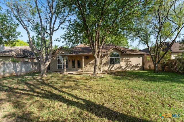 453 Raven Rdg, New Braunfels, TX 78130 - back of property featuring french doors and a patio area