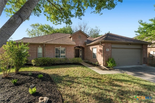 453 Raven Rdg, New Braunfels, TX 78130 - single story home featuring a garage, brick siding, driveway, a front yard, and roof with shingles