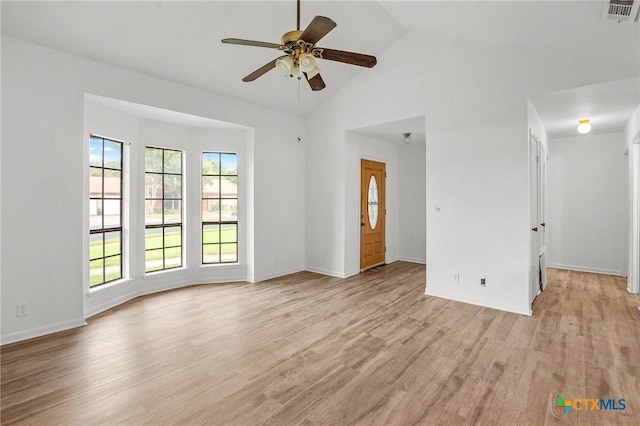 220 Briarmeadow Ln, Victoria, TX 77904 - unfurnished living room featuring ceiling fan, light wood-style floors, and high vaulted ceiling