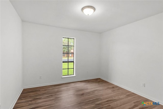 220 Briarmeadow Ln, Victoria, TX 77904 - empty room with wood finished floors and baseboards