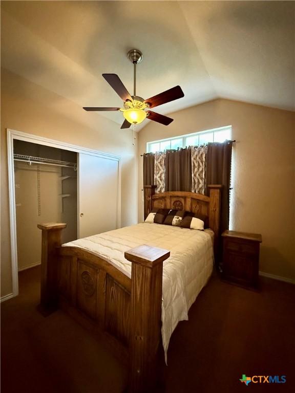 1828 Winchester Dr, Temple, TX 76502 - bedroom with lofted ceiling, ceiling fan, and a closet