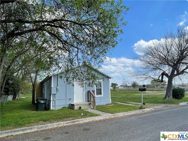 view of front of house with a front yard