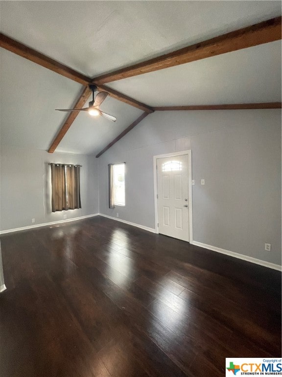 unfurnished living room with ceiling fan, vaulted ceiling with beams, and dark hardwood / wood-style flooring