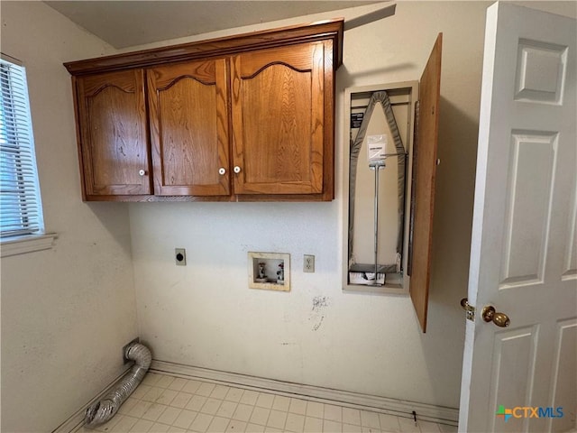 laundry room featuring a healthy amount of sunlight, cabinet space, washer hookup, and hookup for an electric dryer