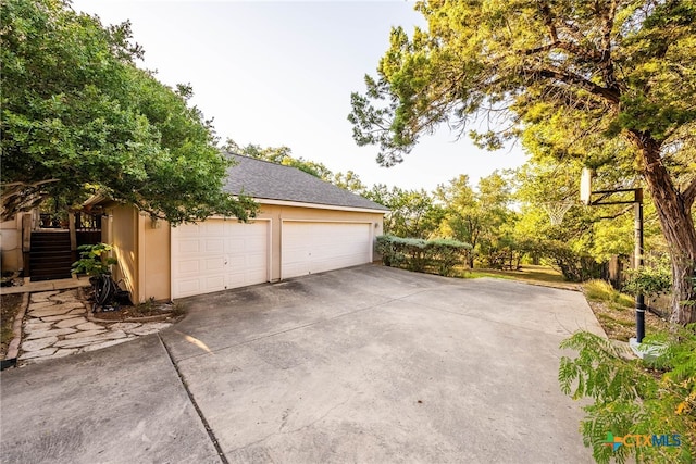 9063 Schoenthal Rd, San Antonio, TX 78266 - garage with concrete driveway