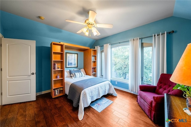 9063 Schoenthal Rd, San Antonio, TX 78266 - bedroom with lofted ceiling, wood finished floors, and a ceiling fan