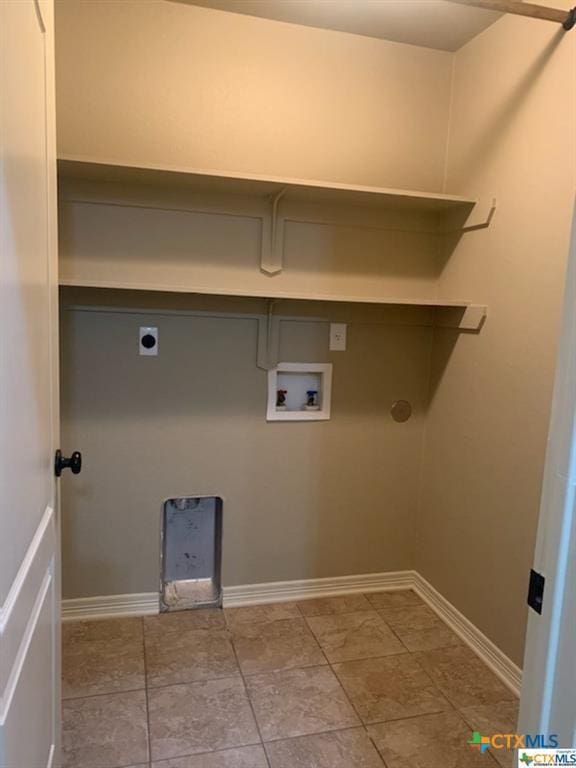 clothes washing area with hookup for an electric dryer and hookup for a washing machine