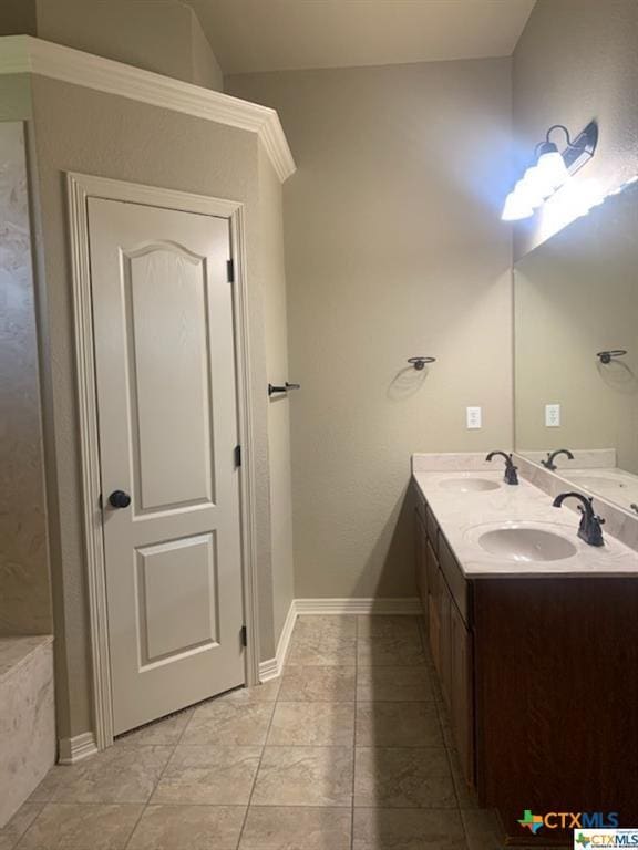 bathroom featuring vanity and tile patterned floors