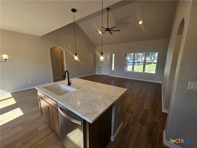 kitchen featuring dark wood-style floors, open floor plan, a sink, and dishwasher