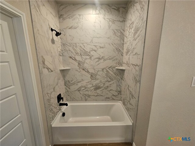 bathroom featuring bathing tub / shower combination