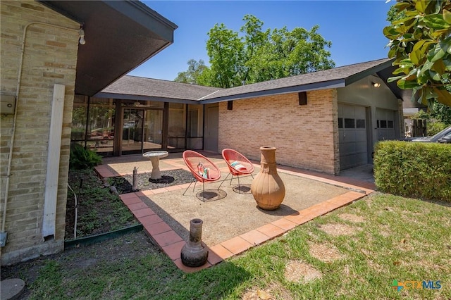 2506 Bon Aire Ave, Victoria, TX 77901 - view of patio with an attached garage