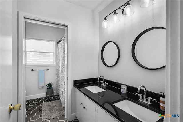 2506 Bon Aire Ave, Victoria, TX 77901 - bathroom featuring double vanity