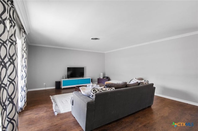 2506 Bon Aire Ave, Victoria, TX 77901 - living area featuring wood finished floors, crown molding, and baseboards