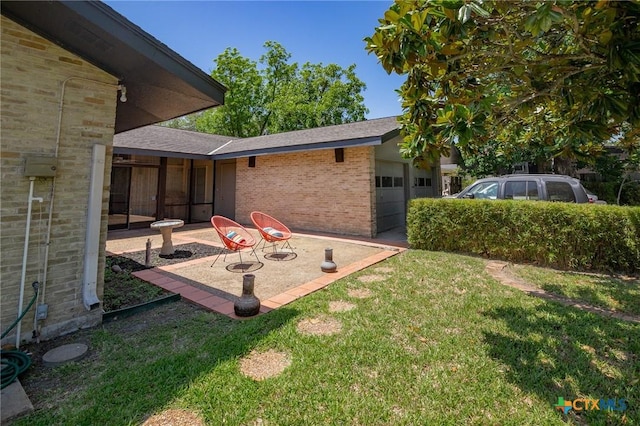 2506 Bon Aire Ave, Victoria, TX 77901 - view of green lawn with a garage