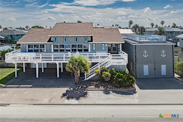 view of front of house with a carport