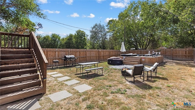 view of yard with an outdoor fire pit