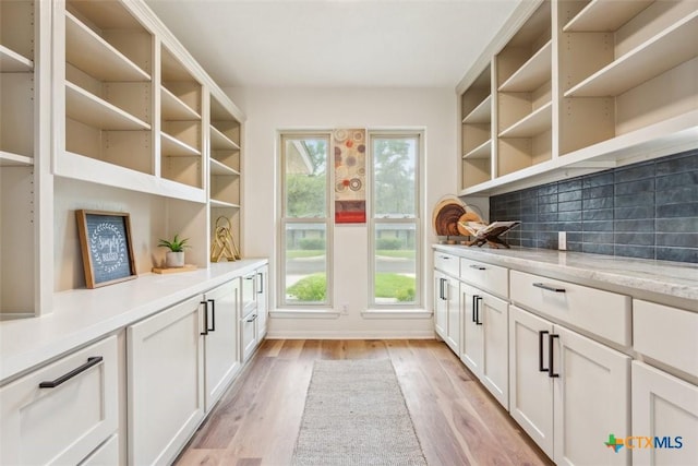 mudroom featuring light wood finished floors