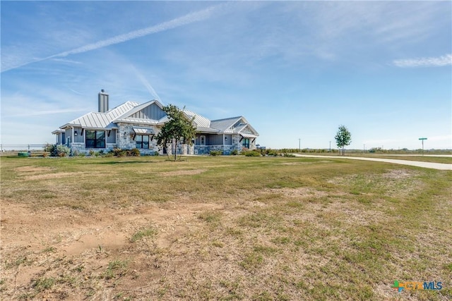 view of front of home with a front yard