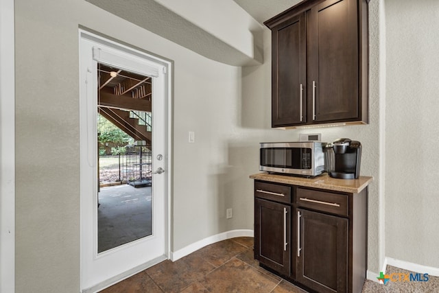 interior space with dark brown cabinetry