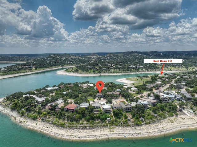 drone / aerial view with a view of the beach and a water view