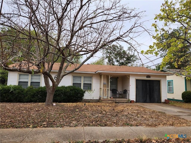 single story home with a garage