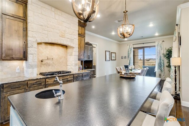 dining space featuring crown molding and dark hardwood / wood-style flooring