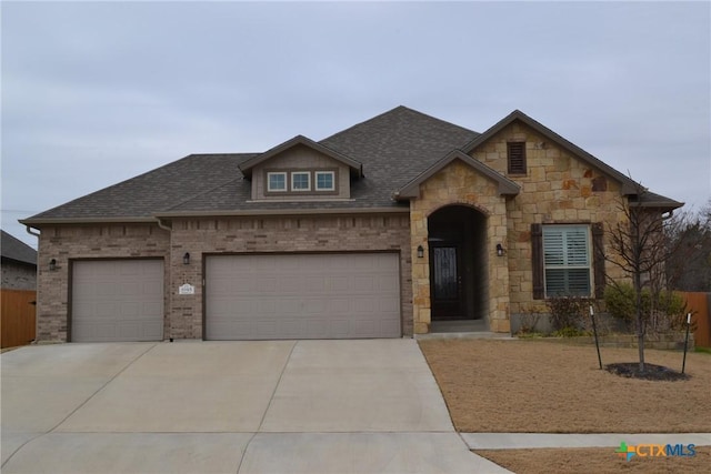 view of front of home with a garage