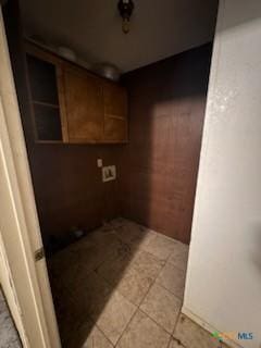 laundry room with light tile patterned flooring