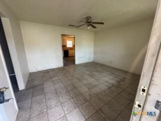 interior space featuring ceiling fan