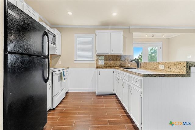 kitchen with white cabinetry, light wood-type flooring, black refrigerator, white electric stove, and sink