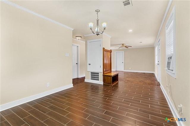 unfurnished living room featuring dark hardwood / wood-style flooring, ornamental molding, and ceiling fan with notable chandelier