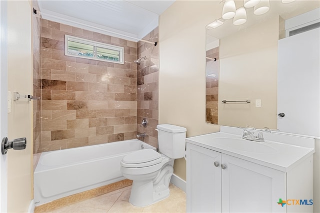 full bathroom featuring toilet, tiled shower / bath combo, vanity, and tile patterned flooring