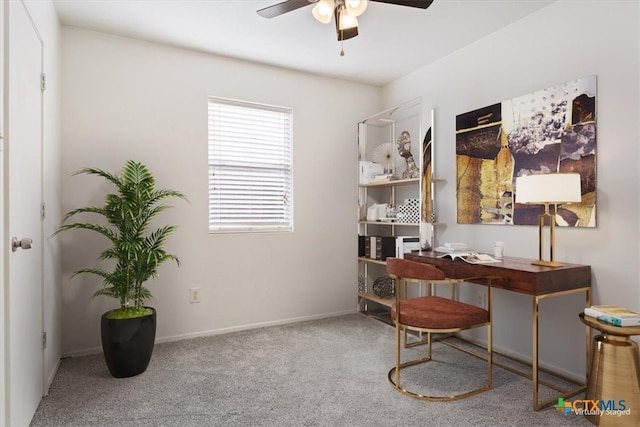 office area with ceiling fan and carpet floors