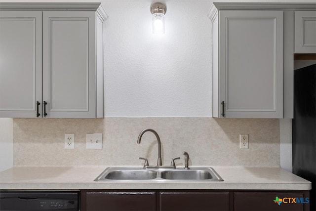 kitchen with gray cabinets, black appliances, and sink