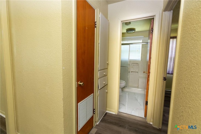3003 Zephyr Rd, Killeen, TX 76543 - hall with a textured wall and dark wood finished floors