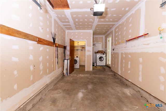 3003 Zephyr Rd, Killeen, TX 76543 - garage featuring washer / dryer and a garage door opener