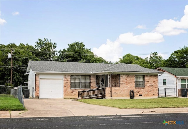 3003 Zephyr Rd, Killeen, TX 76543 - single story home with a garage, brick siding, driveway, and a shingled roof