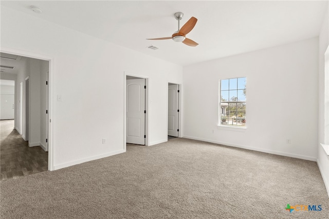 unfurnished bedroom featuring ceiling fan and carpet flooring