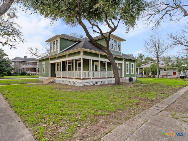 view of front of home featuring a porch, central AC, and a front lawn