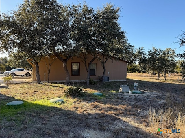 view of home's exterior featuring cooling unit