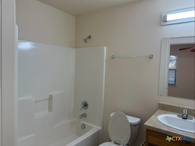 full bathroom with vanity, bathtub / shower combination, and toilet