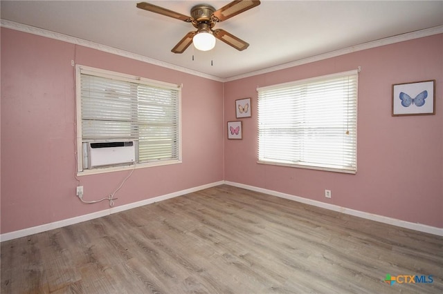 empty room with crown molding, ceiling fan, cooling unit, and a wealth of natural light
